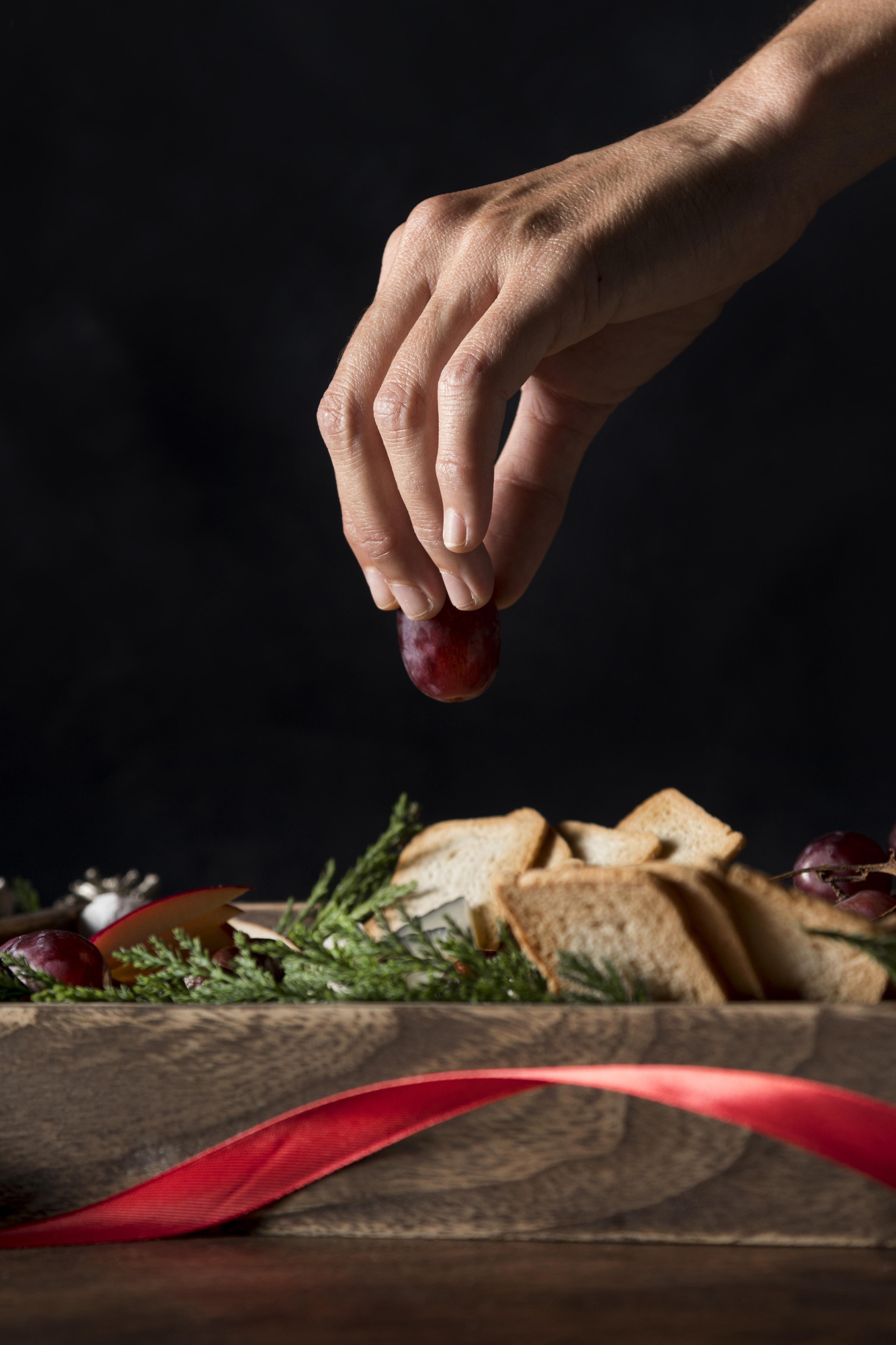 Chef hands finishing garnish on dish